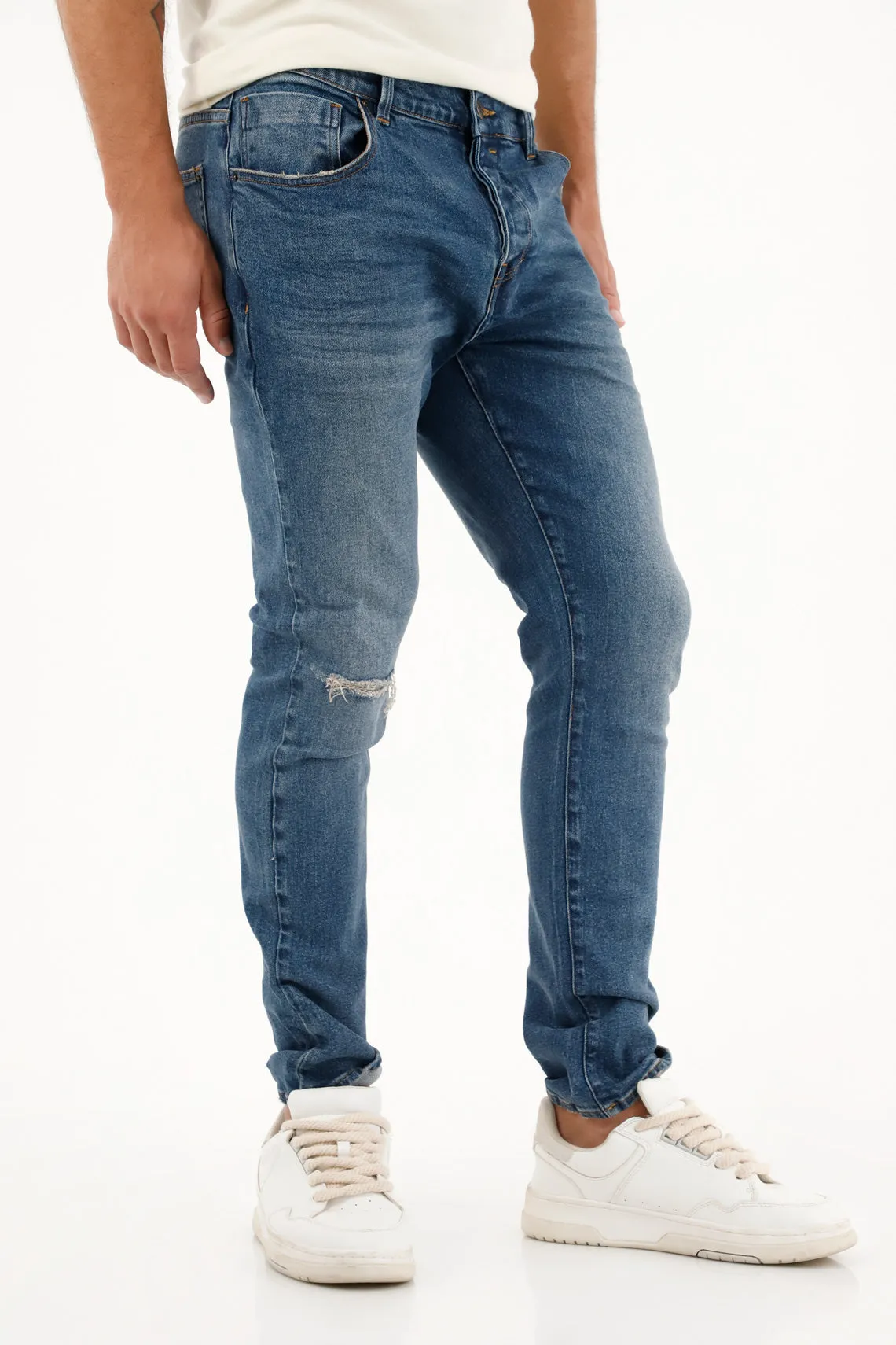 Jean Skinny tiro medio con roto localizado para hombre